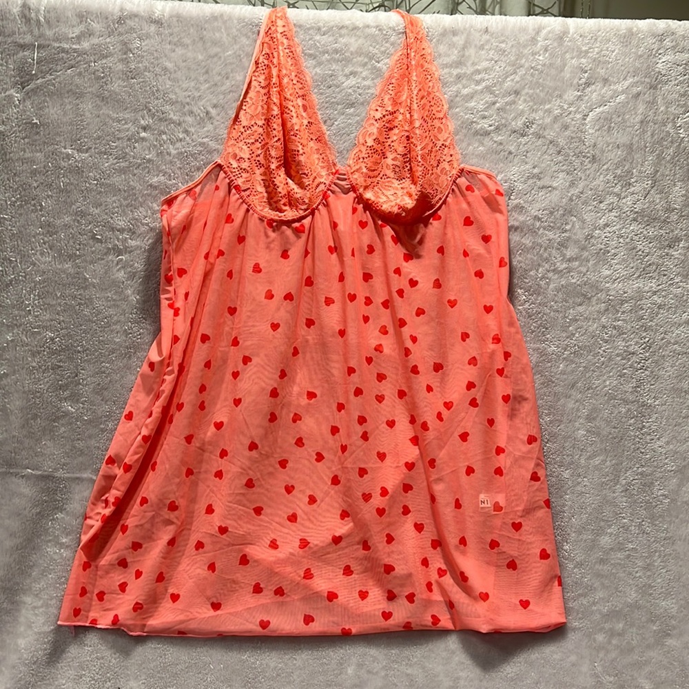 Halter teddy; coral color with red hearts.